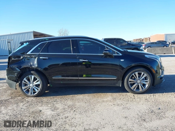 2024 Cadillac XT5 FWD Premium Luxury with VIN 1GYKNCRS4RZ729461, listed as a IAAI auction lot 41411300 with 5,760 mi miles. Bid and sale history available at carsss.com. Image 13.