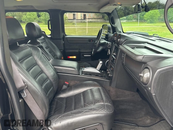 2005 Hummer H2 SUT z VIN 5GRGN22U15H123289, wystawiony jako Copart lot #55254575 z przebiegiem 161 105 mil mil oraz Tytuł czysty. Historia ofert i sprzedaży dostępna na DreamBid. Obrazek 5.