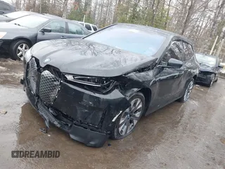 2024 BMW iX xDrive50 z VIN WB523CF04RCR31259, wystawiony jako IAAI lot #41559235 z przebiegiem Nie podano mil oraz . Historia ofert i sprzedaży dostępna na DreamBid. Obrazek 20.