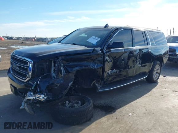 2016 GMC Yukon XL SLE with VIN 1GKS1FKC9GR442107, listed as a IAAI auction lot 41309092 with 130,117 mi miles. Bid and sale history available at carsss.com. Image 2.