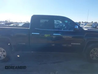 2015 GMC Sierra 1500 SLE z VIN 1GTR1UEC9FZ334983, wystawiony jako IAAI lot #41268146 z przebiegiem 203 084 mil mil oraz . Historia ofert i sprzedaży dostępna na DreamBid. Obrazek 13.