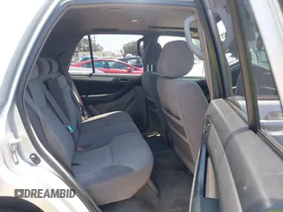 2003 Toyota 4Runner SR5 z VIN JTEZU14R830003562, wystawiony jako IAAI lot #42408101 z przebiegiem 269 316 mil mil oraz . Historia ofert i sprzedaży dostępna na DreamBid. Obrazek 8.
