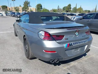 2012 BMW 6 Series 650i with VIN WBALZ3C5XCDL70748, listed as a IAAI auction lot 41762203 with 102,519 mi miles. Bid and sale history available at carsss.com. Image 3.