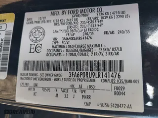 2020 Ford Fusion Hybrid Titanium with VIN 3FA6P0RU9LR141476, listed as a IAAI auction lot 41472921 with 84,433 mi miles. Bid and sale history available at carsss.com. Image 9.