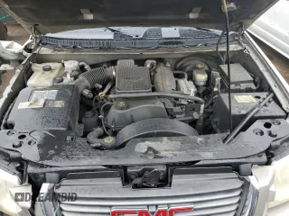 2002 GMC Envoy SLT with VIN 1GKDT13S222296226, listed as a Copart auction lot 51599295 with 148,653 mi miles and Salvage Title. Bid and sale history available at carsss.com. Image 12.