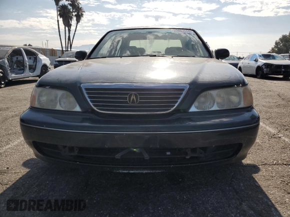 1996 Acura RL with VIN JH4KA965XTC009917, listed as a Copart auction lot 65083665 with 197,486 mi miles and Salvage title. Bid and sale history available at DreamBid. Image 5.