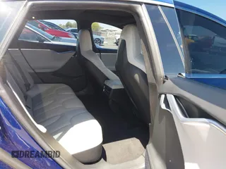 2016 Tesla Model S 70 kWh Battery with VIN 5YJSA1E10GF126433, listed as a IAAI auction lot 42169558 with 120,182 mi miles and . Bid and sale history available at carsss.com. Image 8.