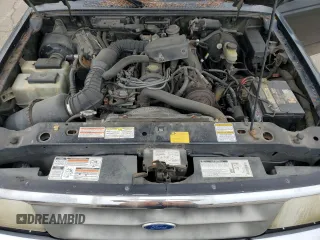 1997 Ford Ranger XL with VIN 1FTCR14A2VPB52159, listed as a Copart auction lot 63452045 with 207,582 mi miles and Salvage title. Bid and sale history available at DreamBid. Image 11.