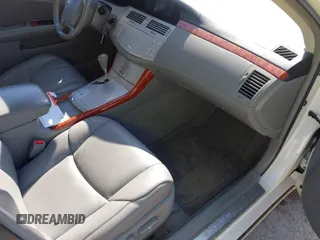 2007 Toyota Avalon XL z VIN 4T1BK36B07U220489, wystawiony jako IAAI lot #42332158 z przebiegiem 157 534 mil mil oraz . Historia ofert i sprzedaży dostępna na DreamBid. Obrazek 5.