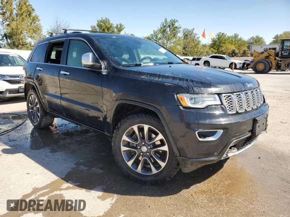 2017 Jeep Grand Cherokee Overland with VIN 1C4RJFCTXHC778491, listed as a Copart auction lot 73944594 with 99,235 mi miles and Clean Title. Bid and sale history available at carsss.com. Image 4.