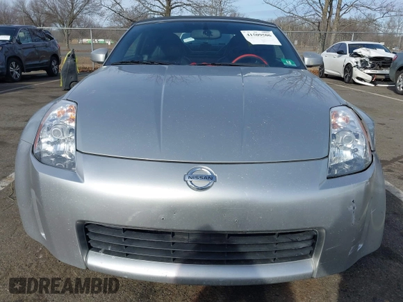 2005 Nissan 350Z Touring z VIN JN1AZ36A05M755776, wystawiony jako IAAI lot #41509506 z przebiegiem 79 148 mil mil oraz . Historia ofert i sprzedaży dostępna na DreamBid. Obrazek 12.