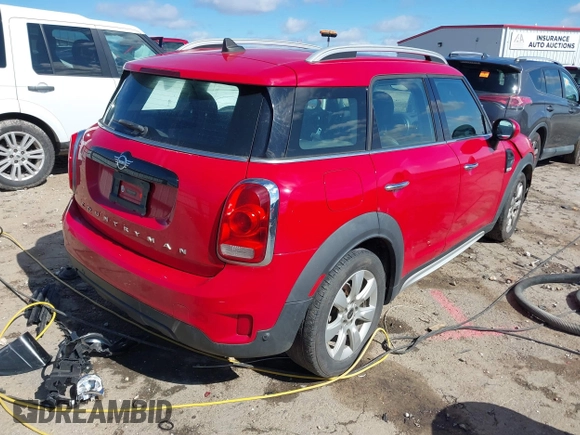 2019 MINI Countryman Cooper with VIN WMZYS7C55K3F45774, listed as a IAAI auction lot 41720883 with 124,599 mi miles and . Bid and sale history available at DreamBid. Image 4.