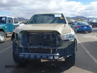 2017 Toyota Tacoma SR5 with VIN 3TMDZ5BN5HM020766, listed as a IAAI auction lot 41778367 with 100,048 mi miles. Bid and sale history available at carsss.com. Image 6.
