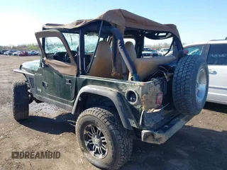 1998 Jeep Wrangler SE with VIN 1J4FY29P6WP709203, listed as a IAAI auction lot 41962877 with 1 mi miles. Bid and sale history available at carsss.com. Image 3.