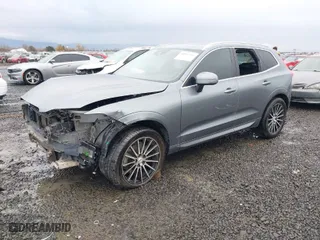 2018 Volvo XC60 Momentum with VIN YV4A22RK3J1093832, listed as a IAAI auction lot 40917553 with 115,056 mi miles. Bid and sale history available at carsss.com. Image 2.