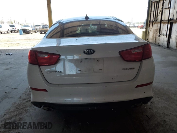 2014 Kia Optima EX z VIN 5XXGN4A71EG275210, wystawiony jako Copart lot #58095515 z przebiegiem 113 030 mil mil oraz Szkoda całkowita • Salvage title. Historia ofert i sprzedaży dostępna na DreamBid. Obrazek 6.