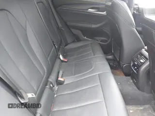 2023 BMW X4 xDrive30i with VIN 5UX33DT01P9N66552, listed as a IAAI auction lot 42103350 with 56,303 mi miles and . Bid and sale history available at DreamBid. Image 8.