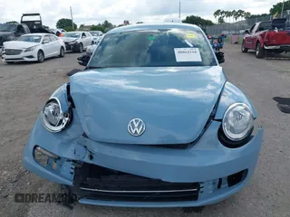 2013 Volkswagen Beetle 2.5L с VIN 3VWJX7AT8DM631449, выставлен на аукционе IAAI как лот 40064318 с пробегом 178 311 миль миль и . История ставок и продаж доступна на DreamBid. Изображение 12.