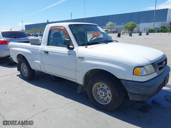 2003 Mazda B-Series 2WD Truck SX with VIN 4F4YR12D53TM11564, listed as a IAAI auction lot 42028399 with 218,402 mi miles. Bid and sale history available at carsss.com. Image 1.
