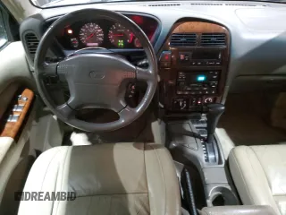 2000 Infiniti QX4 z VIN JNRAR07Y6YW080306, wystawiony jako Copart lot #85022064 z przebiegiem 278 383 mil mil oraz Tytuł czysty. Historia ofert i sprzedaży dostępna na DreamBid. Obrazek 8.
