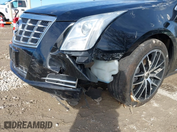 2015 Cadillac XTS Luxury z VIN 2G61N5S35F9155543, wystawiony jako IAAI lot #41699914 z przebiegiem 120 700 mil mil oraz . Historia ofert i sprzedaży dostępna na DreamBid. Obrazek 6.