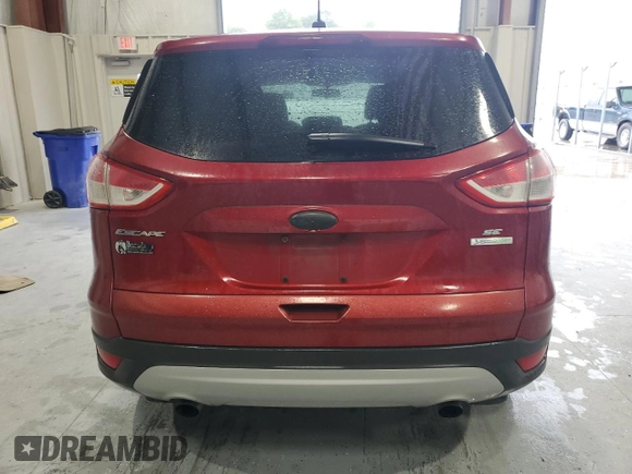 2013 Ford Escape SE z VIN 1FMCU0GX0DUD63803, wystawiony jako Copart lot #55915525 z przebiegiem 138 742 mil mil oraz Szkoda całkowita • Salvage title. Historia ofert i sprzedaży dostępna na DreamBid. Obrazek 6.