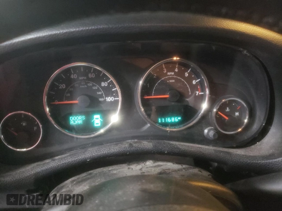 2015 Jeep Wrangler Willys Wheeler with VIN 1C4AJWAG2FL568130, listed as a Copart auction lot 80682914 with 111,686 mi miles and Salvage title. Bid and sale history available at DreamBid. Image 9.
