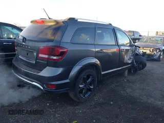 2018 Dodge Journey Crossroad with VIN 3C4PDDGGXJT386542, listed as a IAAI auction lot 40976857 with 147,853 mi miles and . Bid and sale history available at DreamBid. Image 4.
