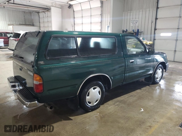 1999 Toyota Tacoma with VIN 4TANL42N4XZ453505, listed as a Copart auction lot 63399325 with 175,198 mi miles and Salvage title. Bid and sale history available at DreamBid. Image 3.