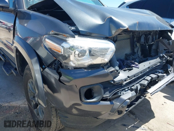 2023 Toyota Tacoma SR5 z VIN 3TMAZ5CN8PM201702, wystawiony jako IAAI lot #42060855 z przebiegiem 17 705 mil mil oraz . Historia ofert i sprzedaży dostępna na DreamBid. Obrazek 20.