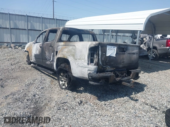 2018 GMC Canyon 2WD SLE z VIN 1GTG5CEN2J1280716, wystawiony jako IAAI lot #42295776 z przebiegiem Nie podano mil oraz . Historia ofert i sprzedaży dostępna na DreamBid. Obrazek 3.