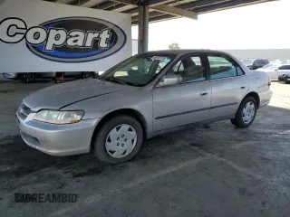 1999 Honda Accord LX z VIN 1HGCG1640XA011756, wystawiony jako Copart lot #56797175 z przebiegiem 191 097 mil mil oraz Czysty tytuł • Clean title. Historia ofert i sprzedaży dostępna na DreamBid. Obrazek 1.