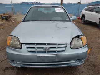2003 Hyundai Accent GL with VIN KMHCG45C43U465523, listed as a IAAI auction lot 40883056 with 95,770 mi miles. Bid and sale history available at carsss.com. Image 12.