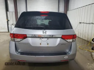 2016 Honda Odyssey SE with VIN 5FNRL5H31GB109718, listed as a Copart auction lot 54689915 with 48,933 mi miles and Salvage Title. Bid and sale history available at DreamBid. Image 6.