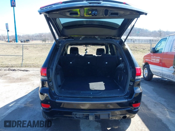 2021 Jeep Grand Cherokee 80th Anniversary with VIN 1C4RJFBG9MC745643, listed as a IAAI auction lot 41729989 with 88,567 mi miles and . Bid and sale history available at DreamBid. Image 18.