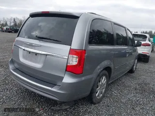 2016 Chrysler Town & Country Touring with VIN 2C4RC1BG4GR292735, listed as a IAAI auction lot 41931677 with 140,708 mi miles. Bid and sale history available at carsss.com. Image 4.