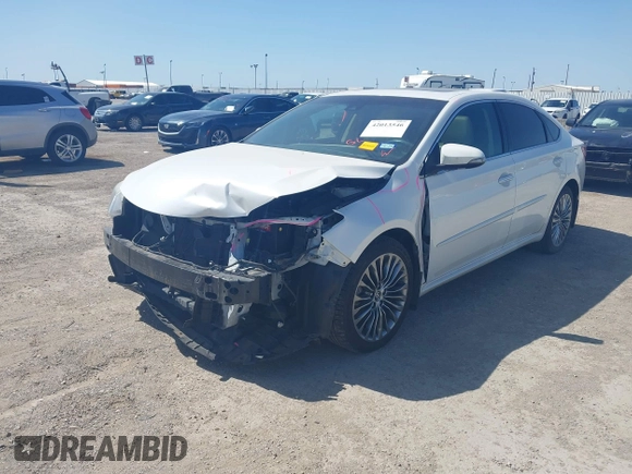 2016 Toyota Avalon Limited with VIN 4T1BK1EB7GU241409, listed as a IAAI auction lot 42013546 with 142,786 mi miles and . Bid and sale history available at carsss.com. Image 2.