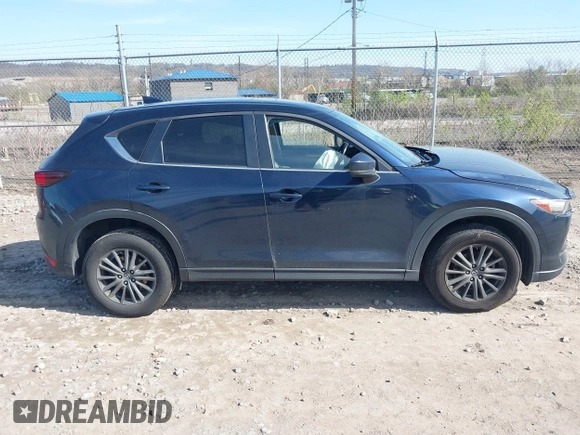 2019 Mazda CX-5 Touring with VIN JM3KFBCM8K0518806, listed as a IAAI auction lot 42038168 with 61,449 mi miles and . Bid and sale history available at DreamBid. Image 13.