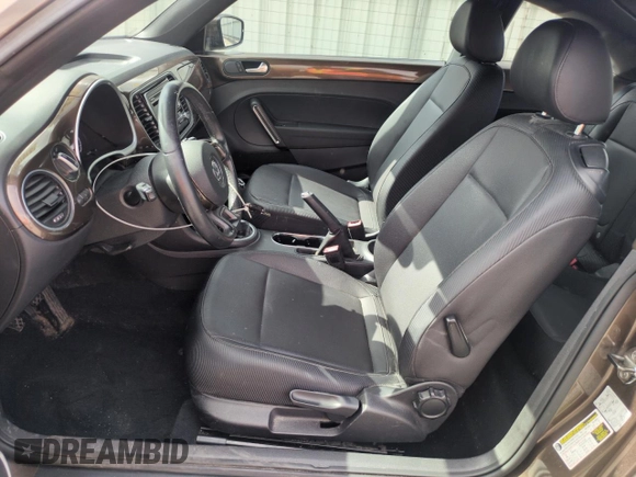 2013 Volkswagen Beetle with VIN 3VWHX7AT8DM603424, listed as a Copart auction lot 51019185 with 136,196 mi miles and Salvage Title. Bid and sale history available at DreamBid. Image 7.