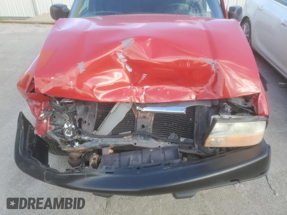 2003 GMC Sonoma SLS z VIN 1GTCS19X538165030, wystawiony jako Copart lot #81485724 z przebiegiem Nie podano mil oraz Szkoda całkowita • Salvage title. Historia ofert i sprzedaży dostępna na DreamBid. Obrazek 12.