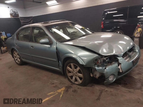 2002 Nissan Maxima GLE z VIN JN1DA31A12T308581, wystawiony jako IAAI lot #41742949 z przebiegiem 116 892 mil mil oraz . Historia ofert i sprzedaży dostępna na DreamBid. Obrazek 1.