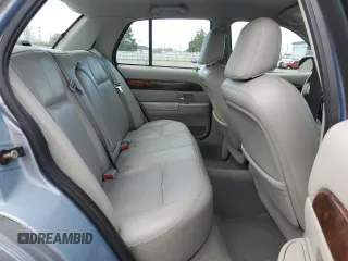2005 Mercury Grand Marquis GS z VIN 2MEFM74W25X624329, wystawiony jako Copart lot #50945805 z przebiegiem 140 717 mil mil oraz Tytuł czysty. Historia ofert i sprzedaży dostępna na DreamBid. Obrazek 10.