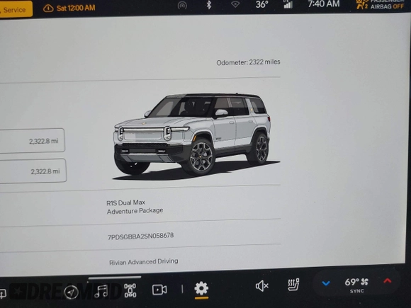 2025 Rivian R1S Adventure z VIN 7PDSGBBA2SN058678, wystawiony jako IAAI lot #41429201 z przebiegiem 2 322 mil mil oraz . Historia ofert i sprzedaży dostępna na DreamBid. Obrazek 7.
