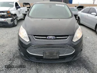 2016 Ford C-Max Energi SEL with VIN 1FADP5CU7GL111944, listed as a Copart auction lot 65802364 with 117,826 mi miles and Salvage Title. Bid and sale history available at carsss.com. Image 5.