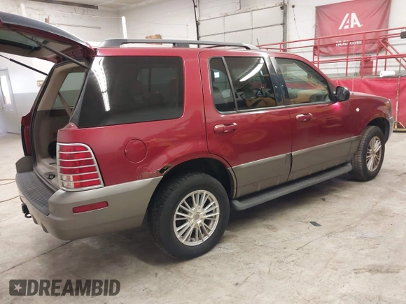 2003 Mercury Mountaineer Convenience z VIN 4M2ZU86K23UJ14446, wystawiony jako IAAI lot #41801753 z przebiegiem 150 629 mil mil oraz . Historia ofert i sprzedaży dostępna na DreamBid. Obrazek 4.