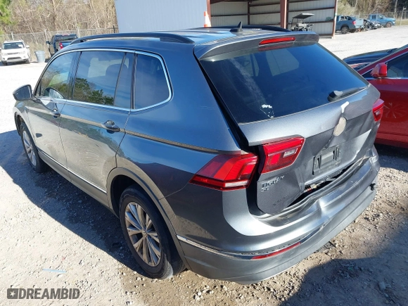 2018 Volkswagen Tiguan SEL with VIN 3VV3B7AX6JM015971, listed as a IAAI auction lot 41712580 with 138,681 mi miles. Bid and sale history available at carsss.com. Image 3.