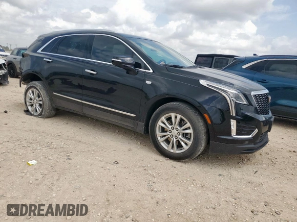 2021 Cadillac XT5 FWD Luxury with VIN 1GYKNAR42MZ120996, listed as a Copart auction lot 63314655 with 49,977 mi miles and Salvage title. Bid and sale history available at DreamBid. Image 4.