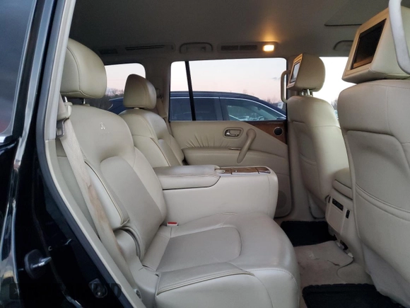 2012 Infiniti QX56 7-passenger with VIN JN8AZ2NE1C9015556, listed as a Copart auction lot 81671054 with 158,247 mi miles and Salvage Title. Bid and sale history available at carsss.com. Image 11.
