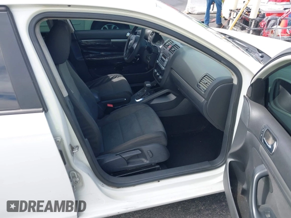 2010 Volkswagen Jetta Sedan S with VIN 3VWJZ7AJ9AM037277, listed as a IAAI auction lot 42044404 with 129,823 mi miles. Bid and sale history available at carsss.com. Image 5.