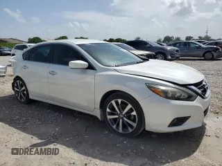 2016 Nissan Altima SL with VIN 1N4AL3AP7GC276084, listed as a Copart auction lot 60063415 with 102,301 mi miles and Salvage title. Bid and sale history available at DreamBid. Image 4.